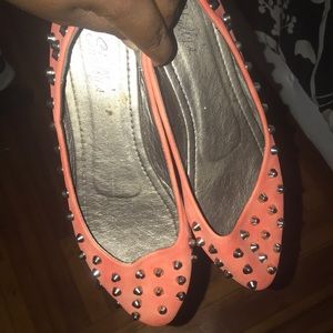 Orange spikey flats
